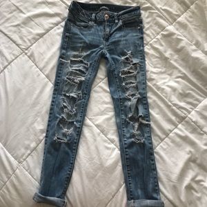 light blue ripped jeans